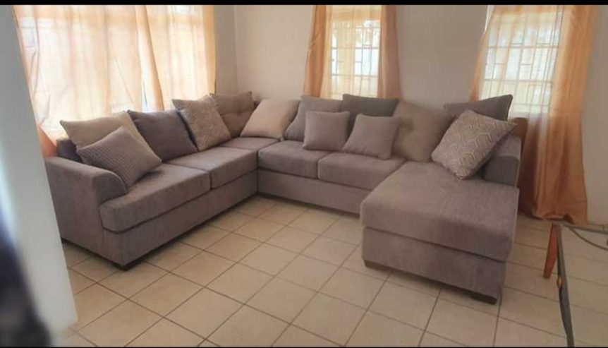 U Shaped sectional, Ottoman and Rug Included