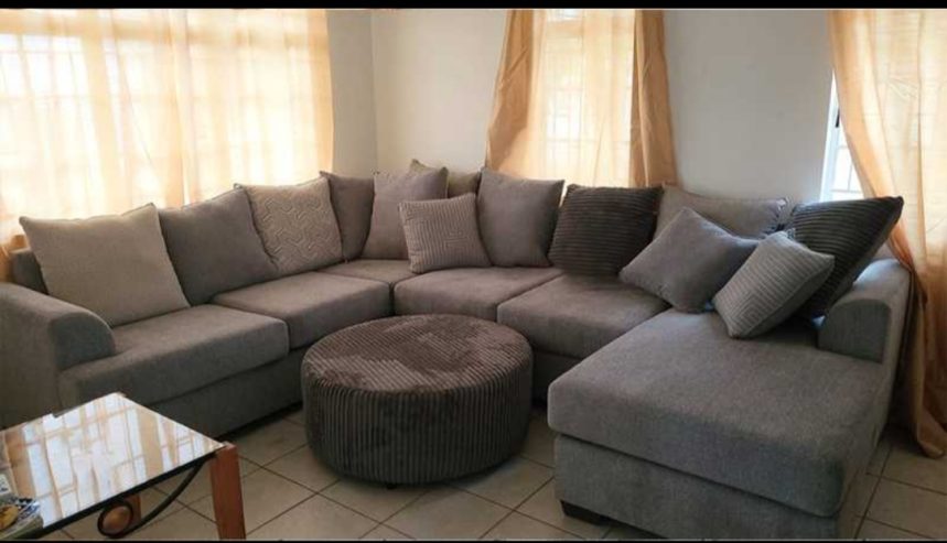 U Shaped sectional, Ottoman and Rug Included